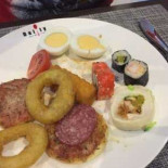 Daily World Kitchen Comida