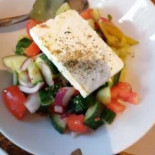 Tzikis Ouzeri Comida