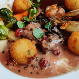 De Verlossing Comida