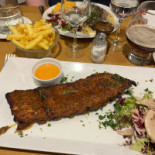 Au Stekerlapatte Comida